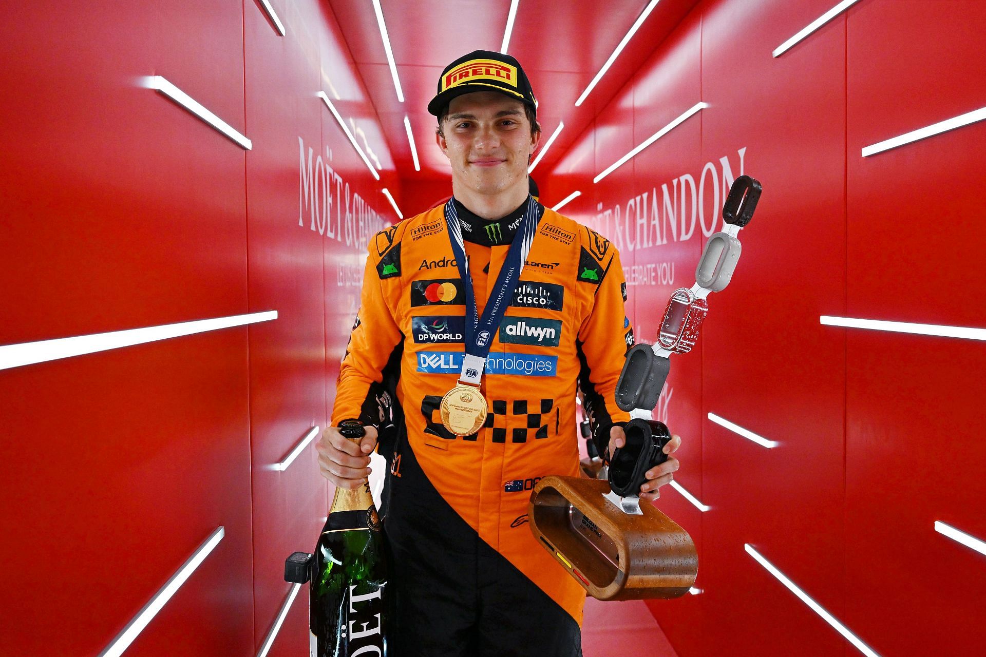 McLaren's Oscar Piastri taking the winner's trophy after winning the 2025 F1 Grand Prix of Belgium - Source: Getty